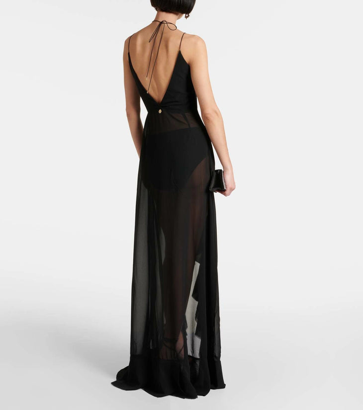 Black ruffled chiffon maxi dress with sheer overlay and strappy back — Banahot | Endless UAE