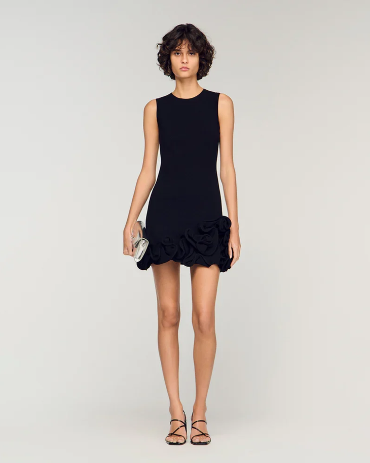 Sleeveless black knit dress with ruffled floral hem detail — Sandro | Endless UAE