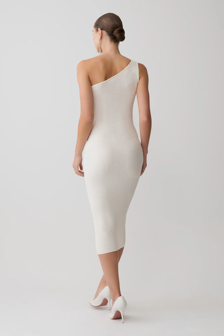 Woman wearing cream cashmere blend knit midi dress with draped off-shoulder overlay and white pointed heels — Meshki | Endless UAE