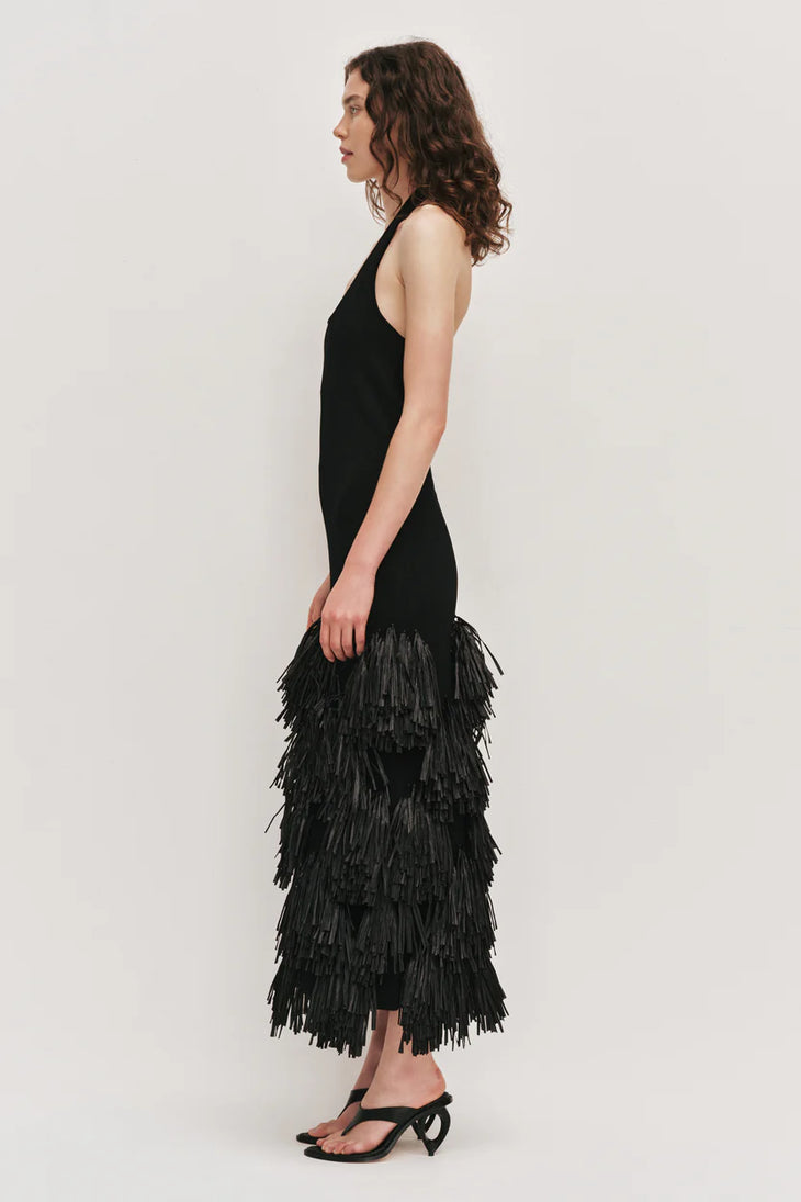 Black halter neck knit dress with tiered raffia fringe skirt — Aje | Endless UAE