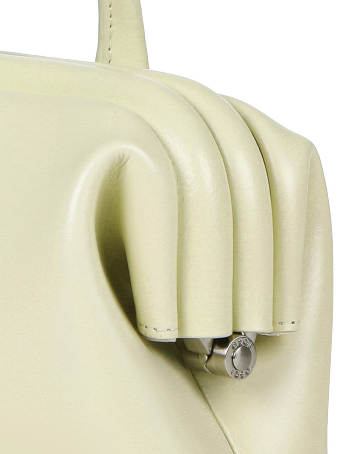 Cream wide boat bag with structured silhouette and silver hardware detail — Osoi | Endless UAE