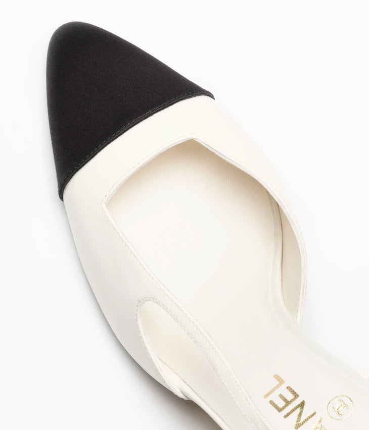 Chanel Métiers d'Art 2026 white and black heeled slingback shoes — Chanel | Endless UAE