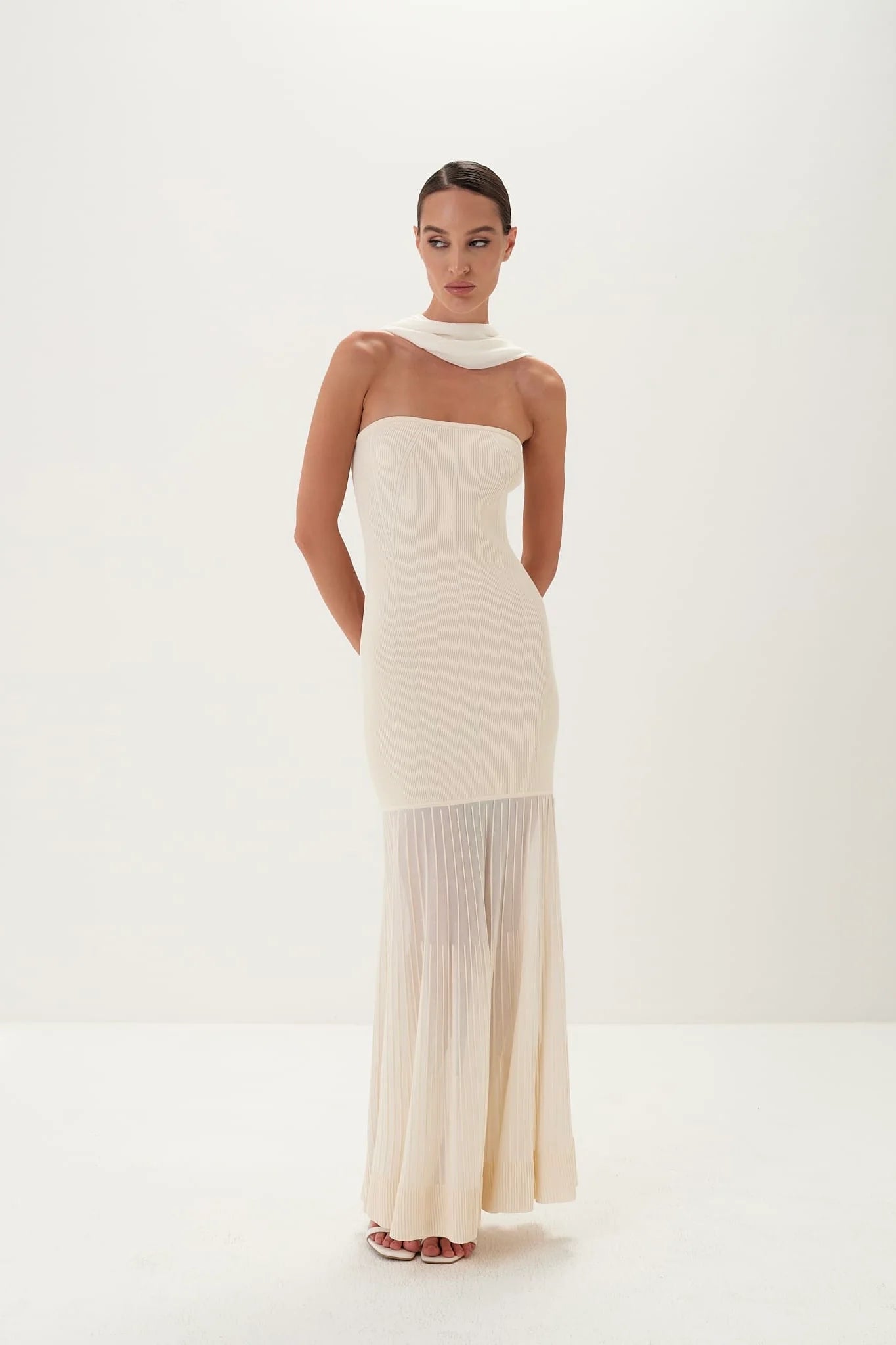 Cream ribbed strapless maxi gown with detachable scarf collar and pleated hem — Nora The Label | Endless UAE