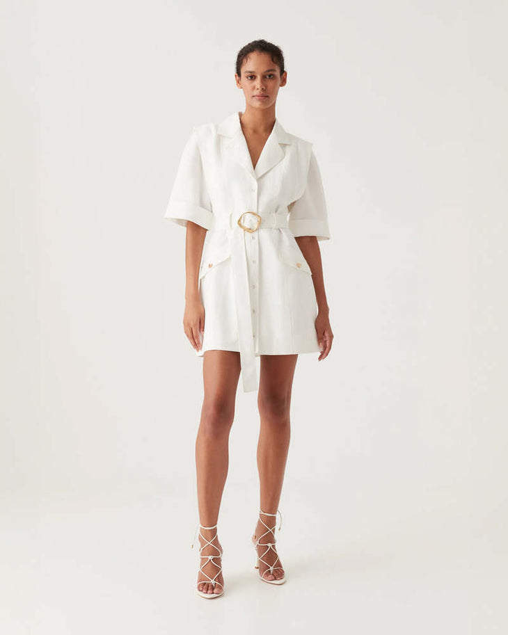 Lyric Belted Mini Dress in white linen with short sleeves and gold buckle belt — Aje | Endless UAE