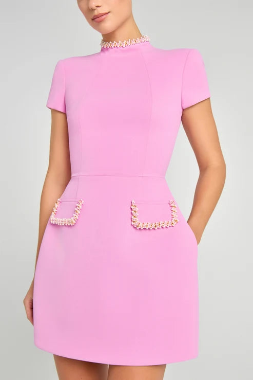 Pink short-sleeve dress with pearl neckline and pocket details — Nadine merabi | Endless UAE