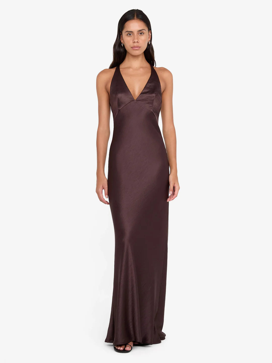 Woman wearing burgundy V-neck sleeveless maxi dress with flowing fabric — Bec & Bridge | Endless UAE