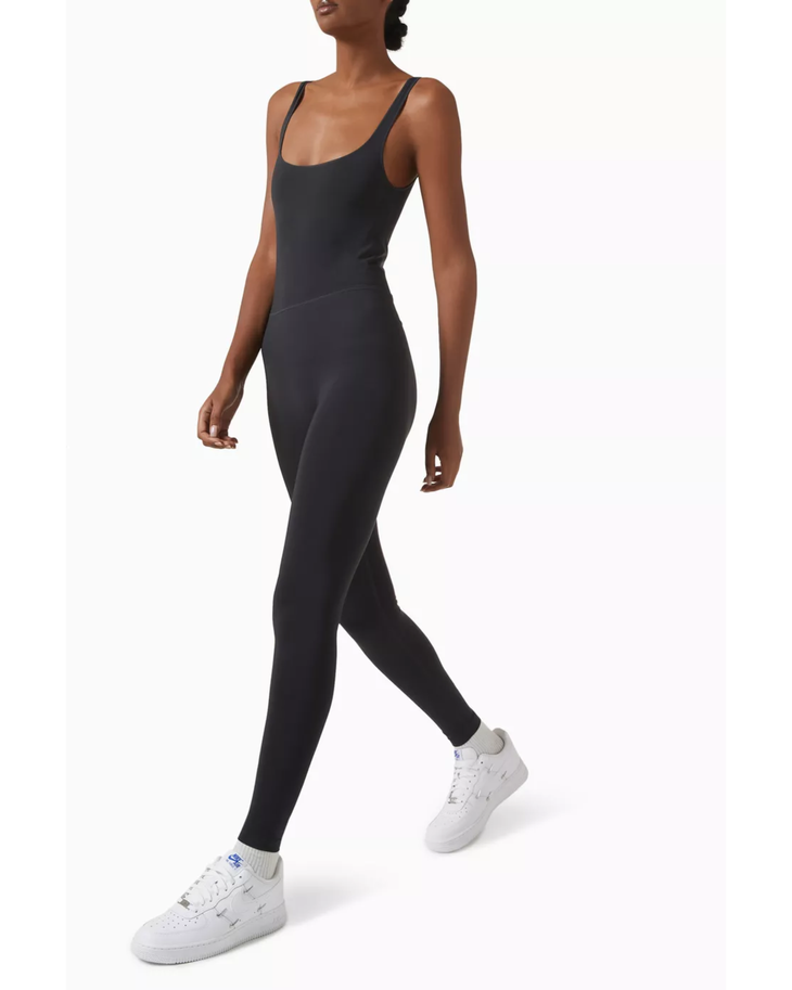 Black seamless catsuit with tank straps and full-length legs — Skims | Endless UAE