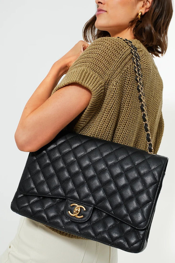 Black quilted leather maxi double flap shoulder bag with gold chain strap — Chanel | Endless UAE