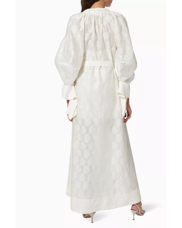 Woman wearing cream linen Parker dress with puffed sleeves and belt — Acler | Endless UAE