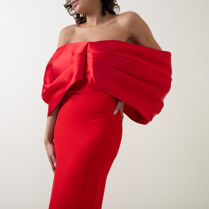 Red off-shoulder gown with dramatic ruffled collar detail — Solace London | Endless UAE