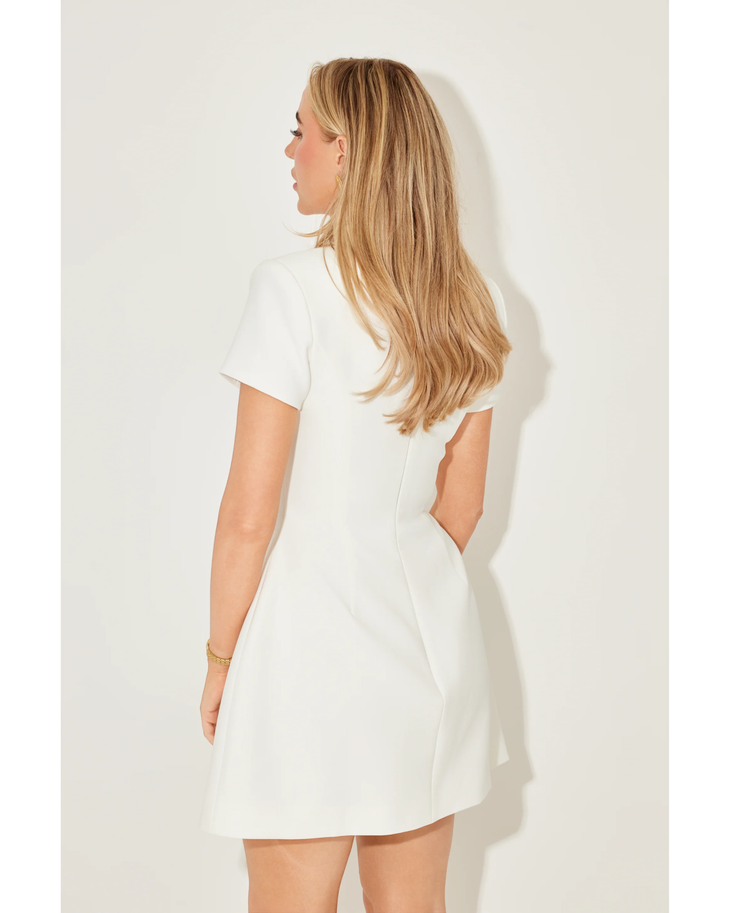 White collared volume mini dress with short sleeves and front pockets — Odd Muse | Endless UAE