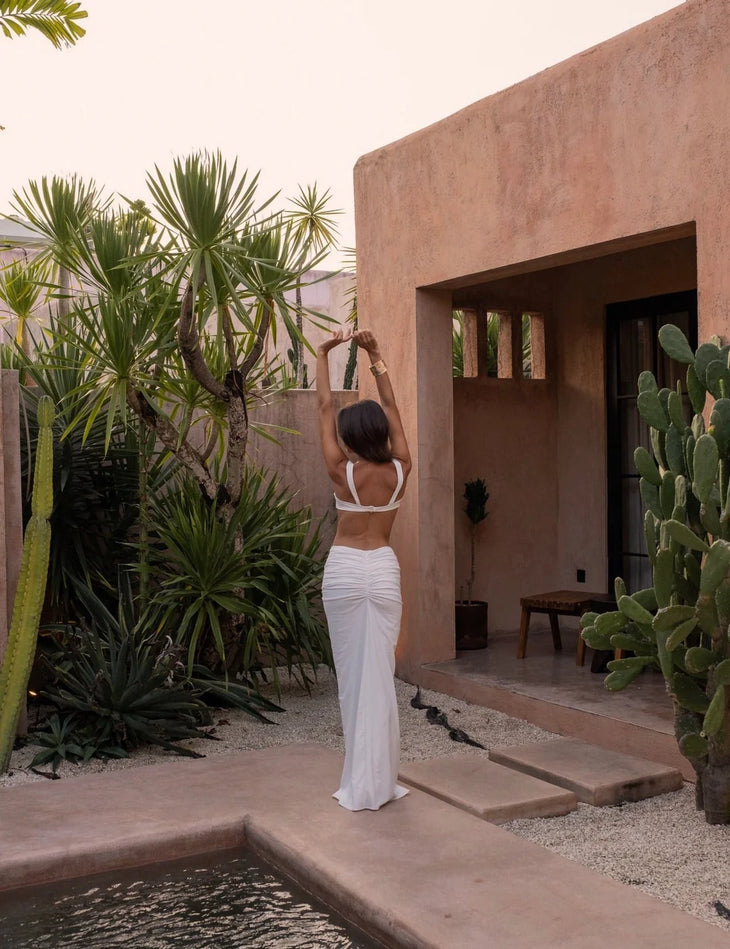 White ruched maxi skirt with matching crop top bikini set — Melissa Phair | Endless UAE