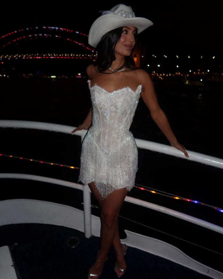 The Monaco Mini white beaded fringe dress on woman at formal event — Kiyoko Handmade | Endless UAE