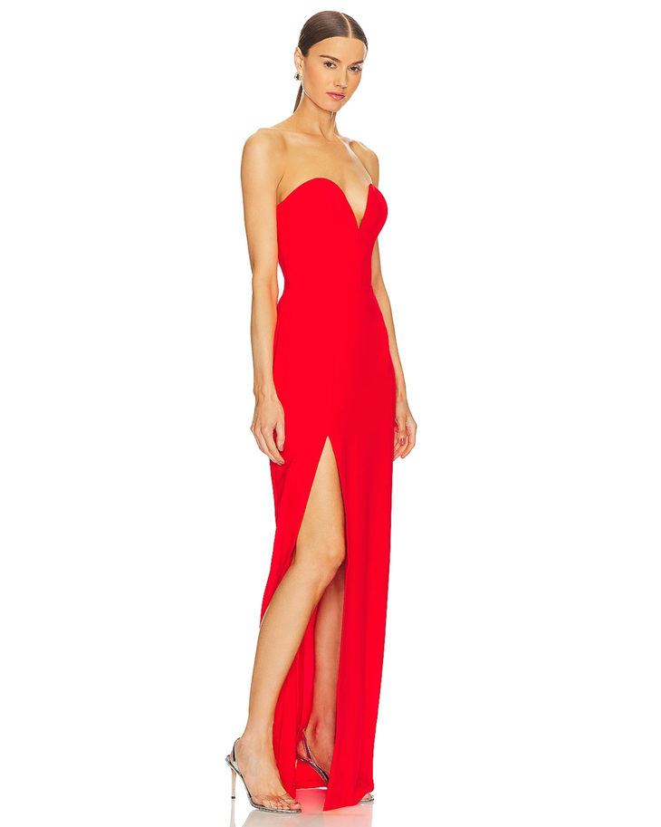 Crimson strapless sweetheart neckline gown with high slit and silver clutch — Amanda Uprichard | Endless UAE
