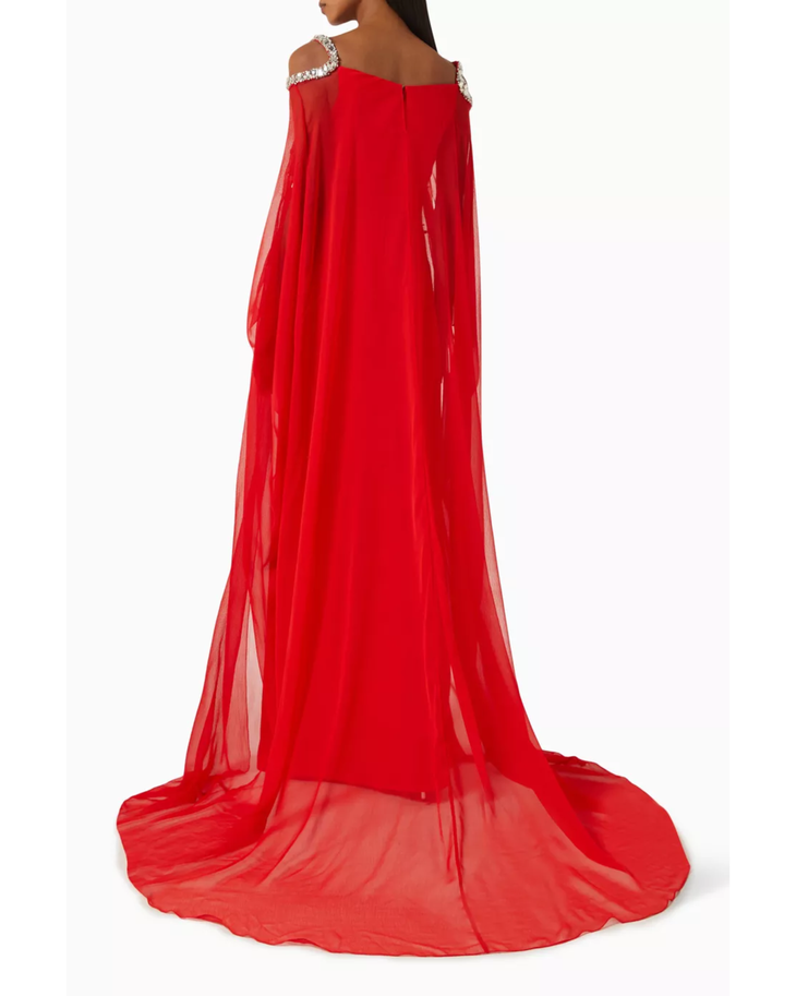 Red embellished cold-shoulder gown with crystal details and flowing cape — Anatomi | Endless UAE