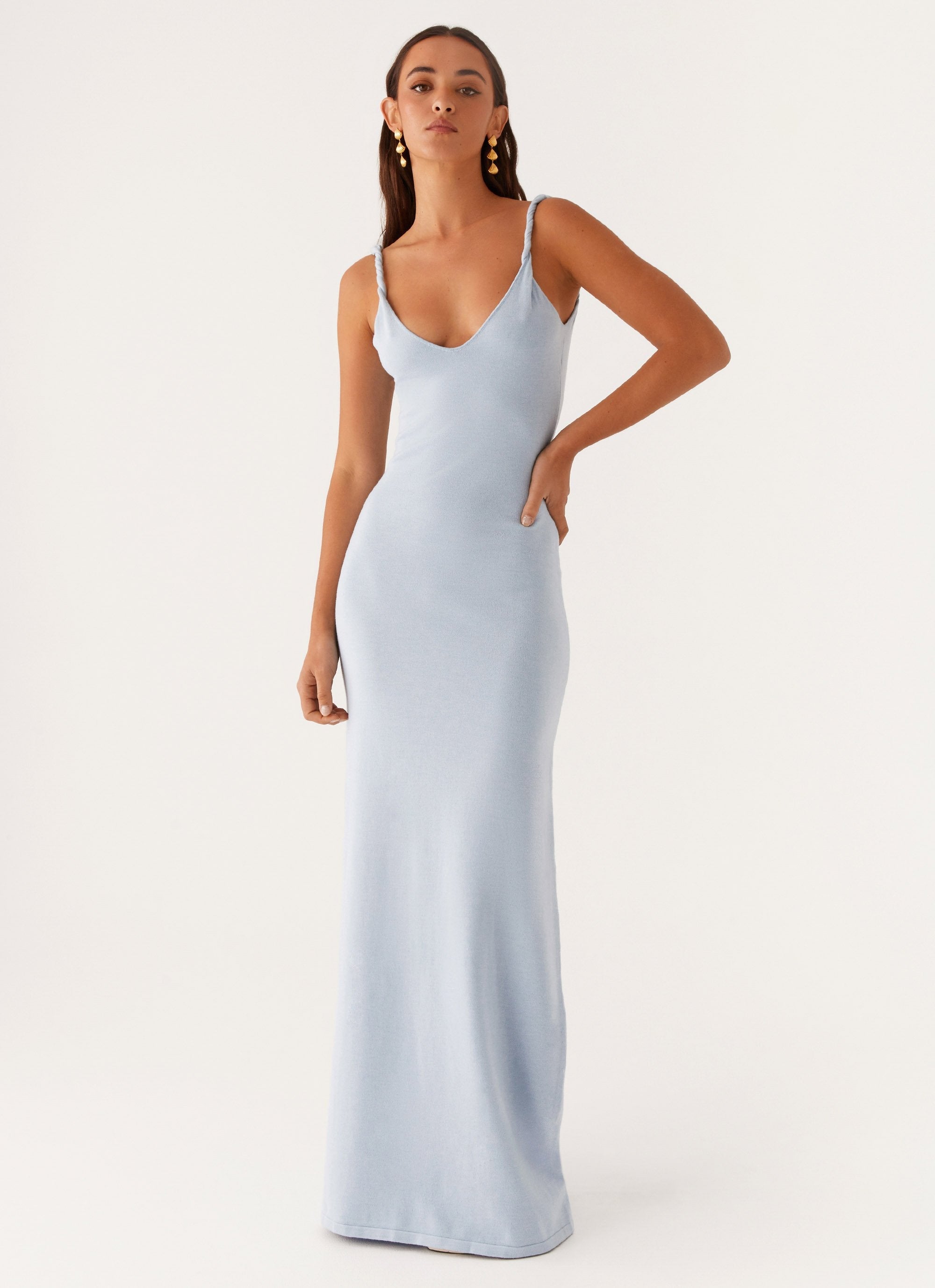 Light blue sleeveless maxi dress with V-neckline on model — Peppermayo | Endless UAE