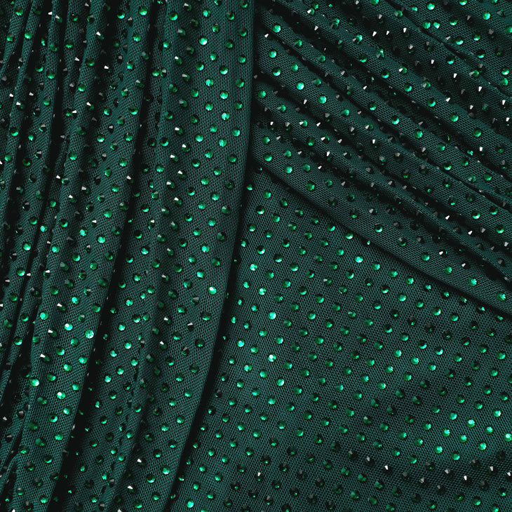 Woman wearing a forest green rhinestone mesh midi dress with long sleeves — Self-portrait | Endless UAE