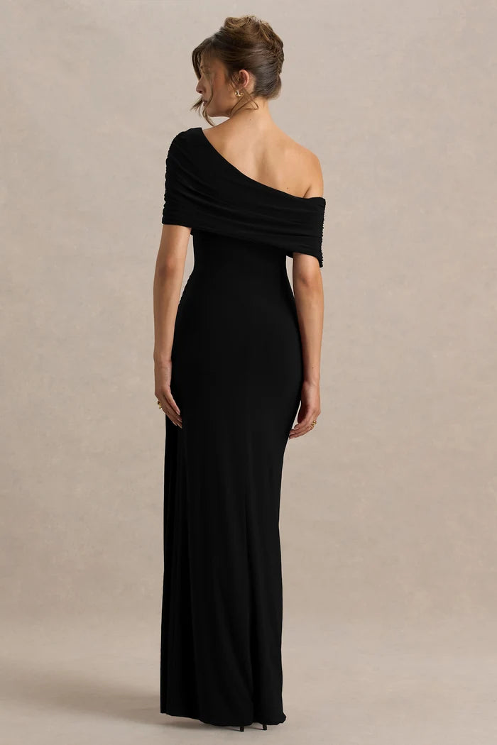 Woman wearing black asymmetric-neck maxi dress with draped off-shoulder sleeve detail — Club London | Endless UAE