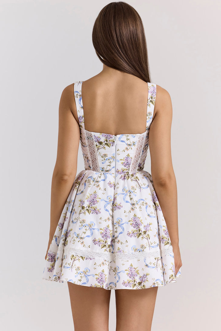 Woman wearing white floral ribbon print cotton mini dress with sweetheart neckline and full skirt — House of CB | Endless UAE