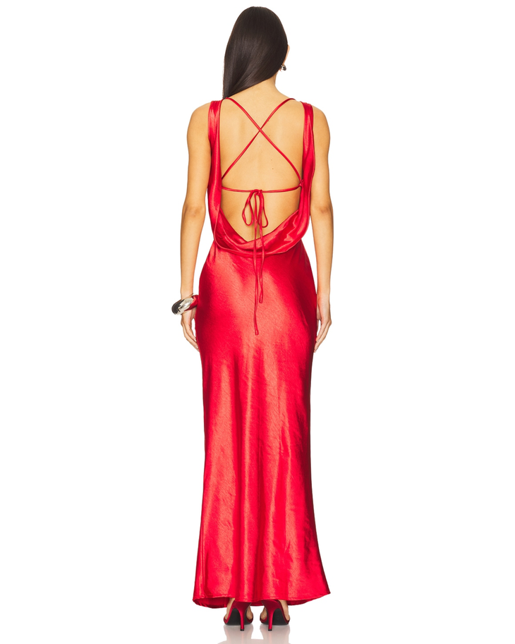 Red sleeveless maxi dress with metallic clutch and silver bangles — Runaway The Label | Endless UAE