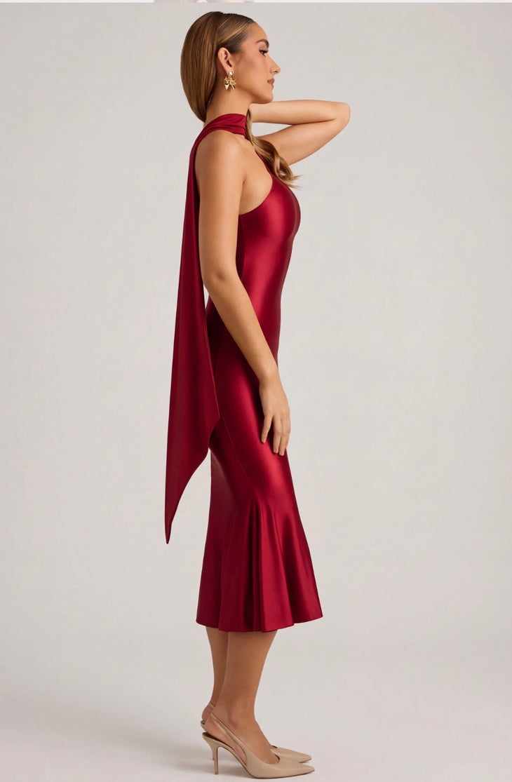 Woman wearing rouge asymmetric scarf-detail midaxi dress with halter neckline and draped hem — Oh Polly | Endless UAE