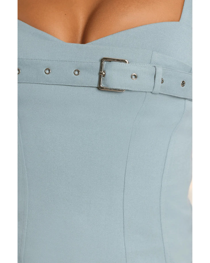Woman wearing light blue sleeveless drop waist mini dress with pleated skirt detail — Oh Polly | Endless UAE