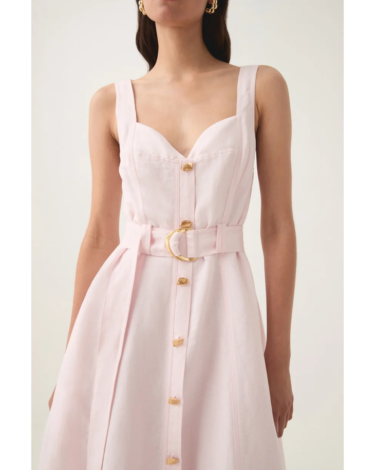 Pale pink sleeveless midi dress with sweetheart neckline, gold button front, and gold belt — Aje | Endless UAE