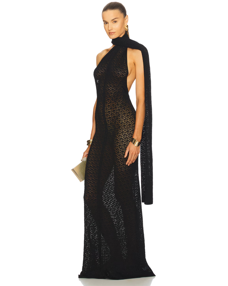 Black lace halter gown with draped wrap detail and gold clutch — Helsa | Endless UAE