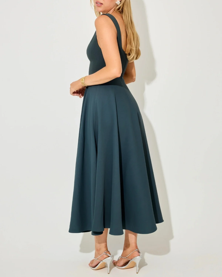 Woman wearing teal square neck midi dress with full skirt and strappy sandals — ODD MUSE | Endless UAE