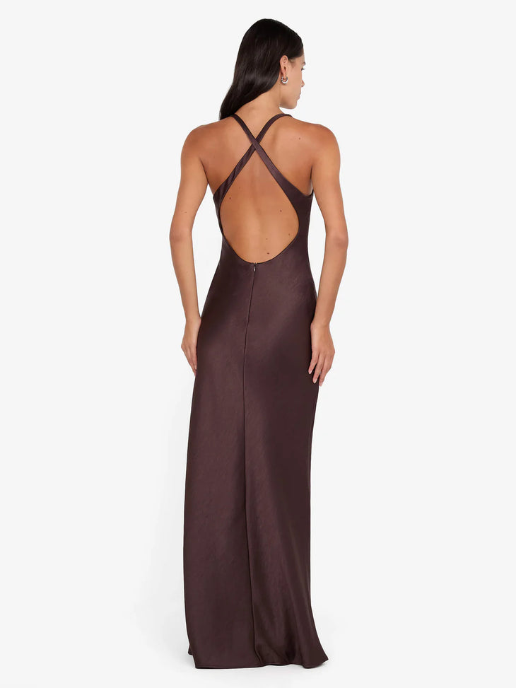 Woman wearing burgundy V-neck sleeveless maxi dress with flowing fabric — Bec & Bridge | Endless UAE