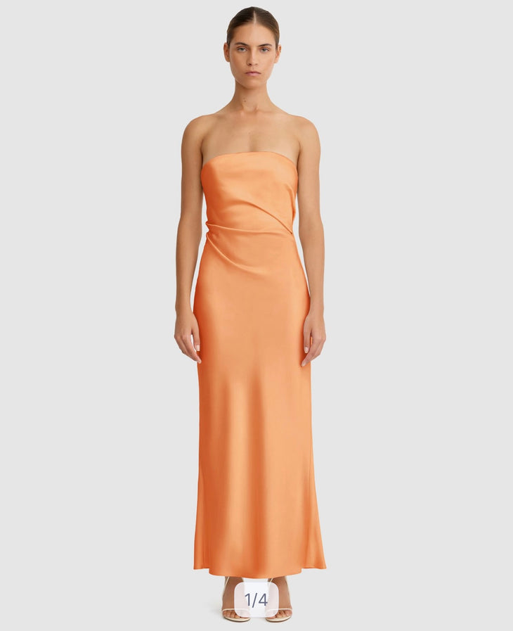 Woman wearing orange strapless maxi dress with ruching detail — Significant Other | Endless UAE