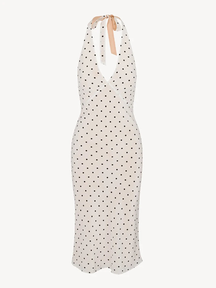 Woman wearing white halter midi dress with black polka dots — Réalisation Par | Endless UAE