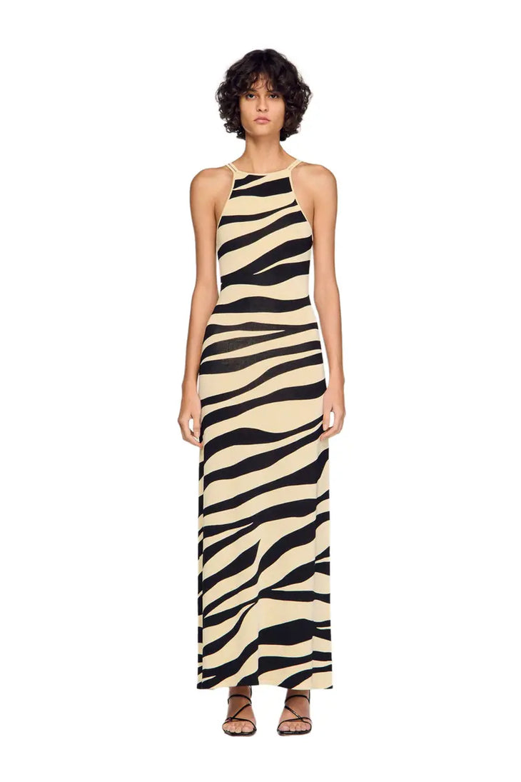 Zebra print knit maxi dress with strappy open back and black heeled sandals — Sandro | Endless UAE