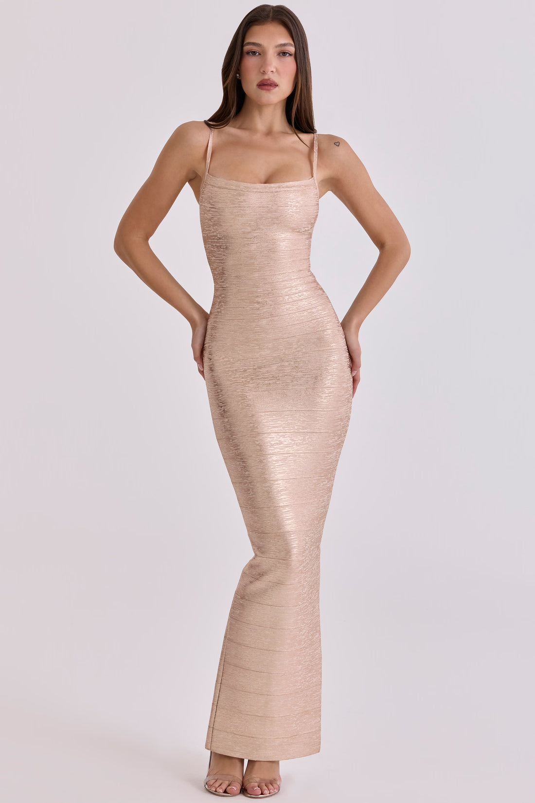 Woman wearing champagne bandage maxi dress with square neckline and thin straps — House of CB | Endless UAE