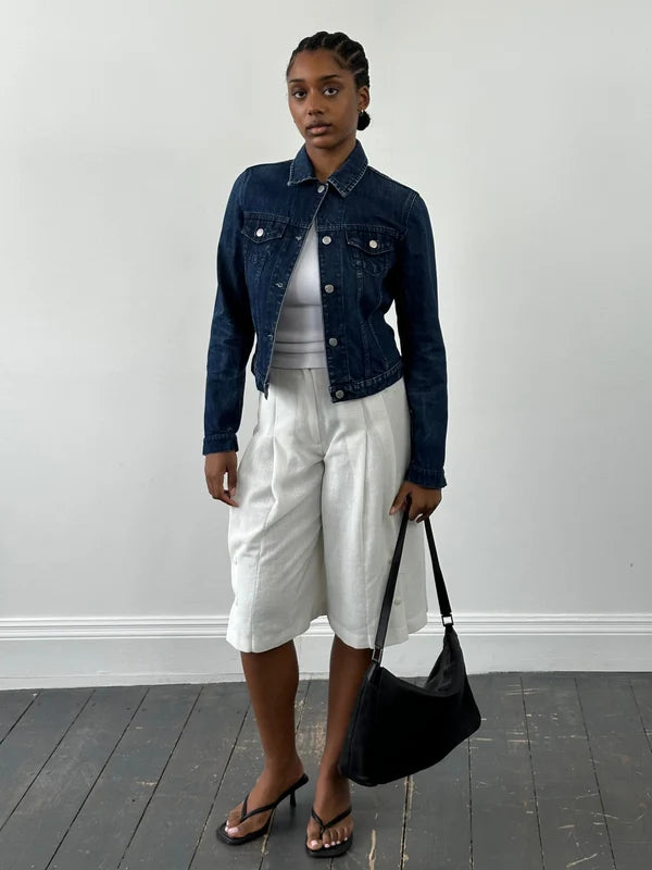 Classic mid-wash denim jacket with silver buttons and chest pockets — Armani Exchange | Endless UAE