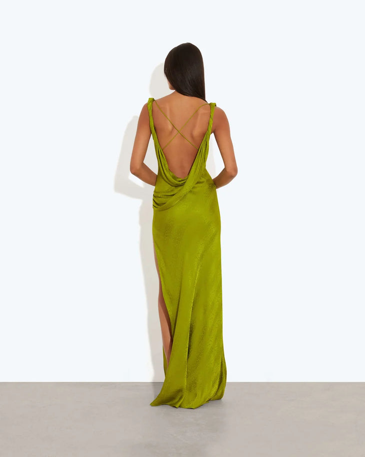 Woman wearing lime green velvet backless maxi dress with draped back detail — Rat & Boa | Endless UAE