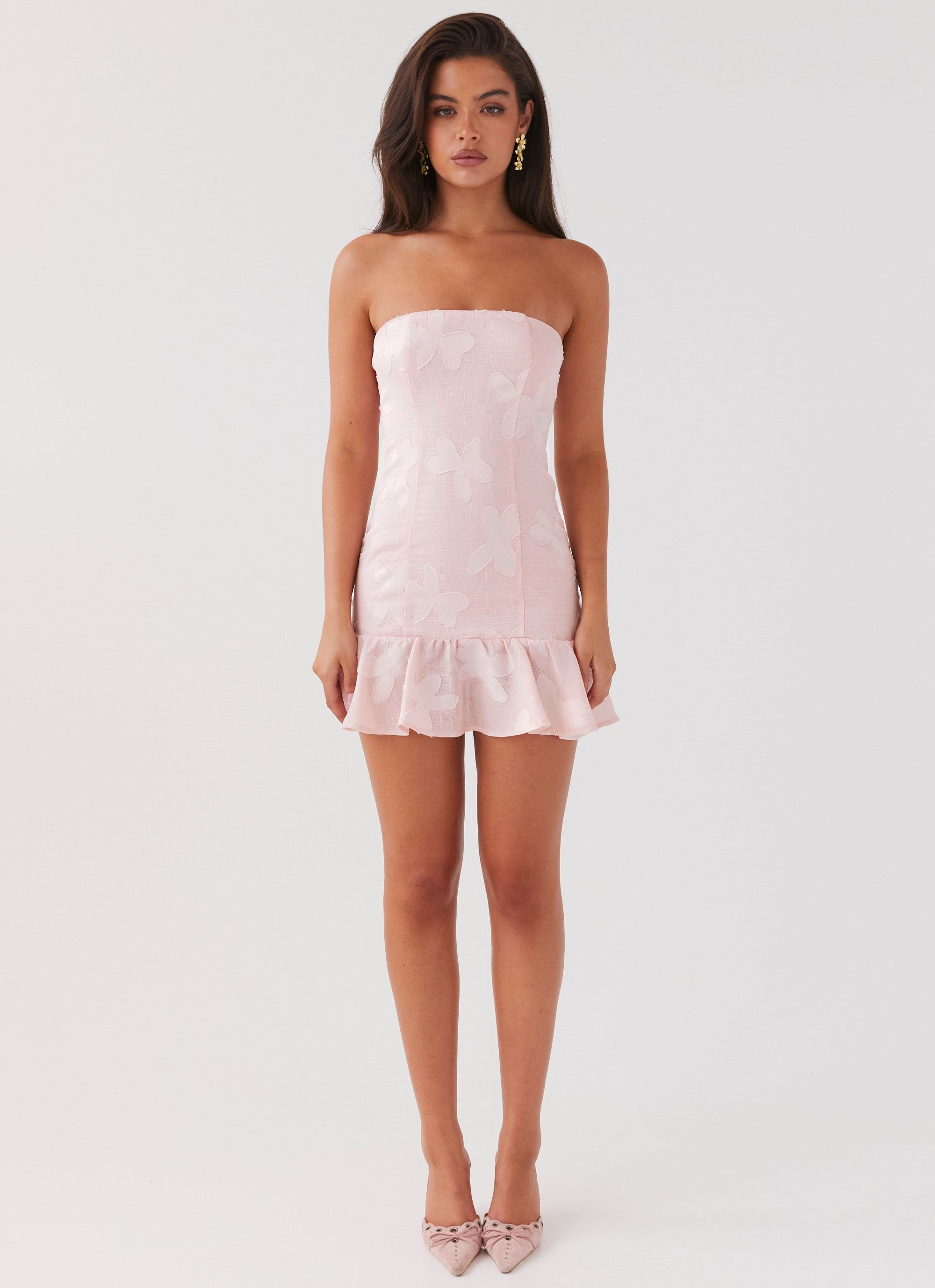 Young Heart Mini Dress in blush pink with strapless neckline and ruffled hem — Peppermayo | Endless UAE