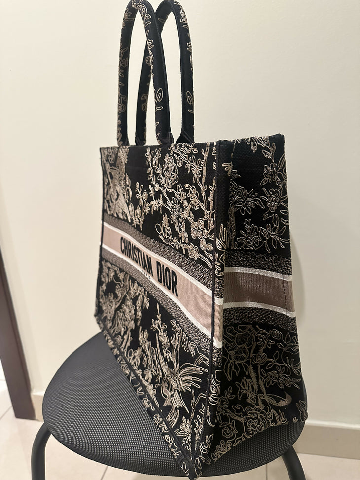 Black embroidered floral Book Tote bag with pink logo band and dual handles — Christian Dior | Endless UAE