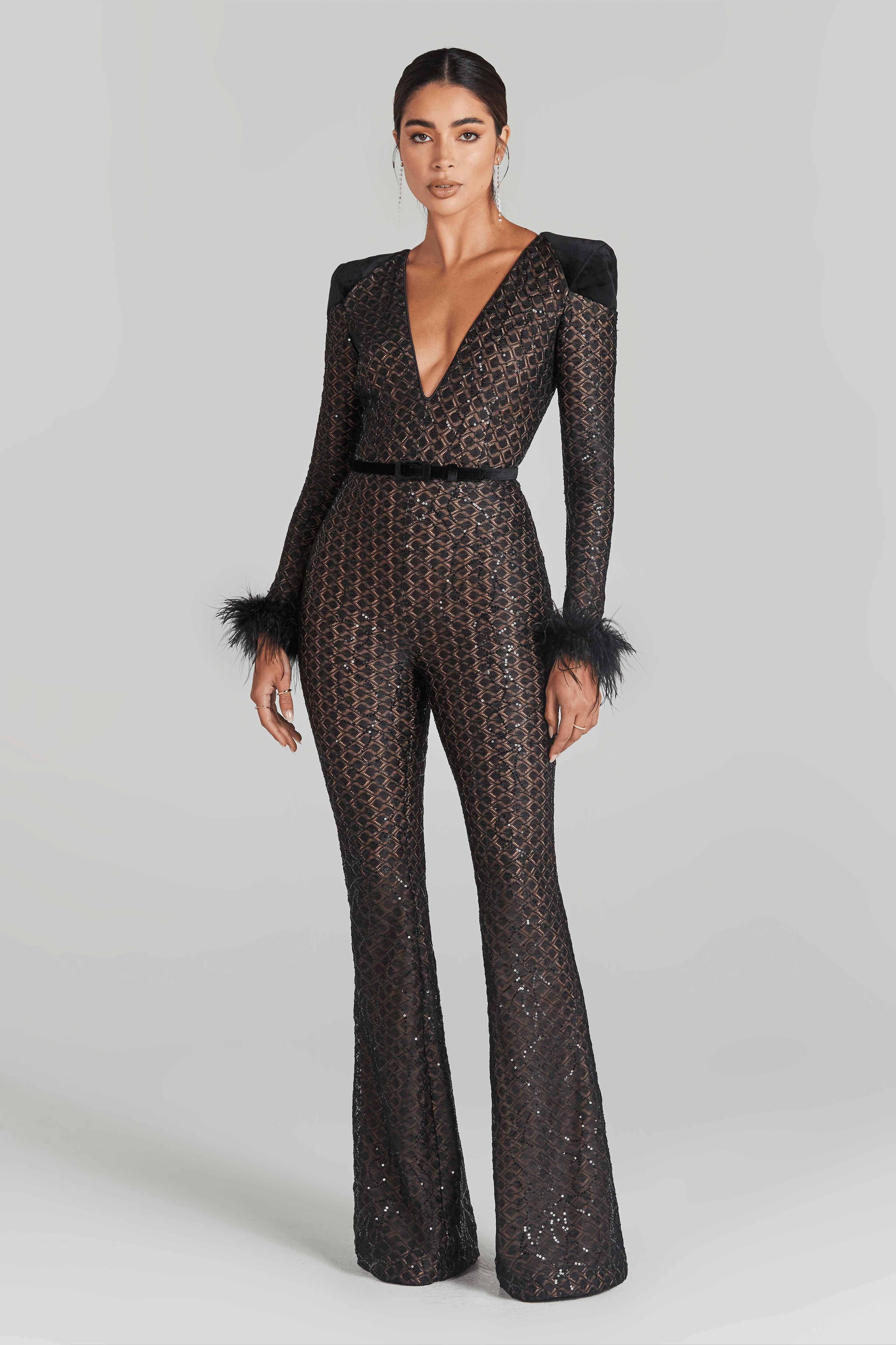 Rachel Black Jumpsuit with sequin detailing, feathered cuffs, and flared legs — Nadine Merabi | Endless UAE