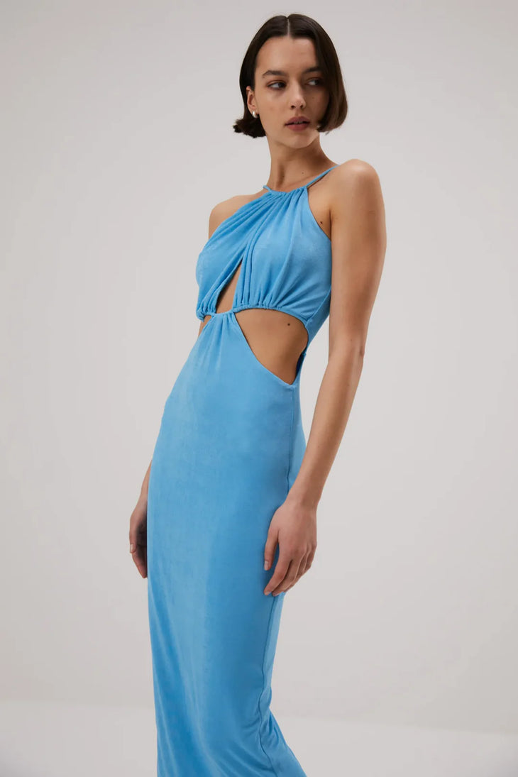 Blue halter neck midi dress with cutout waist detail and gathered bodice on model — Misha | Endless UAE