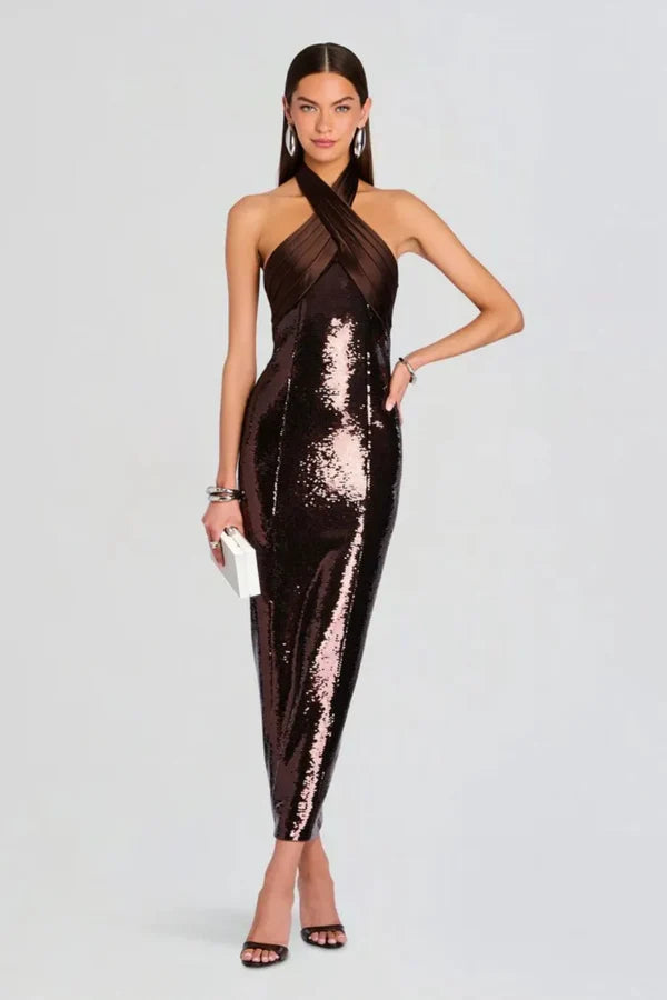 Woman wearing brown sequin halter dress with draped neckline and black heels — Retrofête | Endless UAE