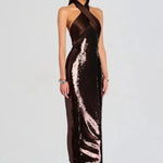 Woman wearing brown sequin halter dress with draped neckline and black heels — Retrofête | Endless UAE