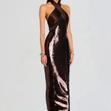 Woman wearing brown sequin halter dress with draped neckline and black heels — Retrofête | Endless UAE