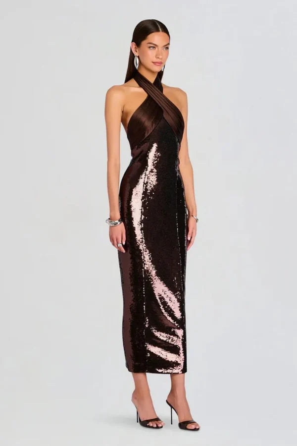 Woman wearing brown sequin halter dress with draped neckline and black heels — Retrofête | Endless UAE