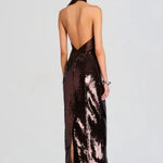 Woman wearing brown sequin halter dress with draped neckline and black heels — Retrofête | Endless UAE
