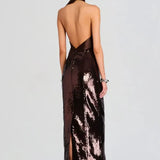 Woman wearing brown sequin halter dress with draped neckline and black heels — Retrofête | Endless UAE