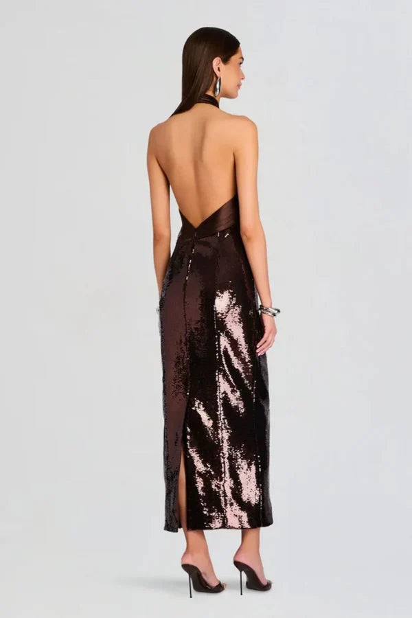 Woman wearing brown sequin halter dress with draped neckline and black heels — Retrofête | Endless UAE