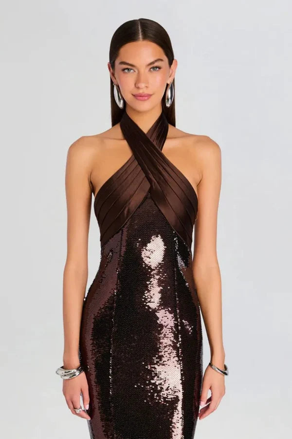 Woman wearing brown sequin halter dress with draped neckline and black heels — Retrofête | Endless UAE