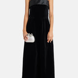 Black velvet strapless gown with satin trim and silver clutch — Dice Kayek | Endless UAE