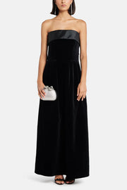 Black velvet strapless gown with satin trim and silver clutch — Dice Kayek | Endless UAE